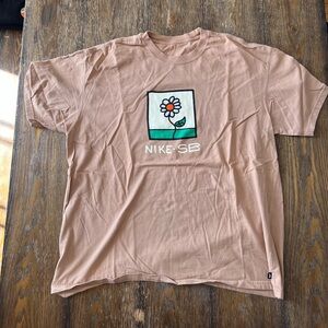 Nike Pink Graphic Short Sleeve Tee with Flower Logo